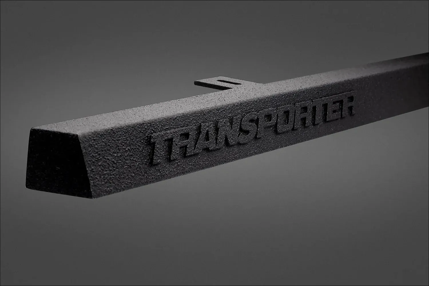 Black textured metal finish product detail photography