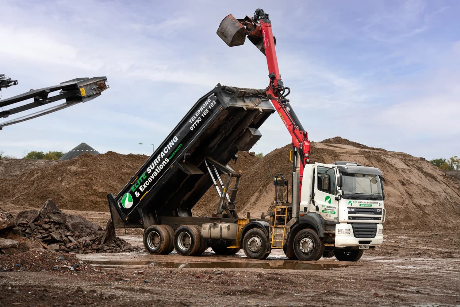 Grab lorry tipping aggregate, haulage and logistics photography