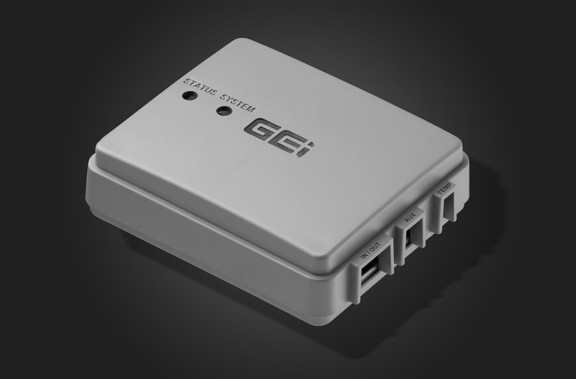 White moulded electronics enclosure photographed on a dark studio background