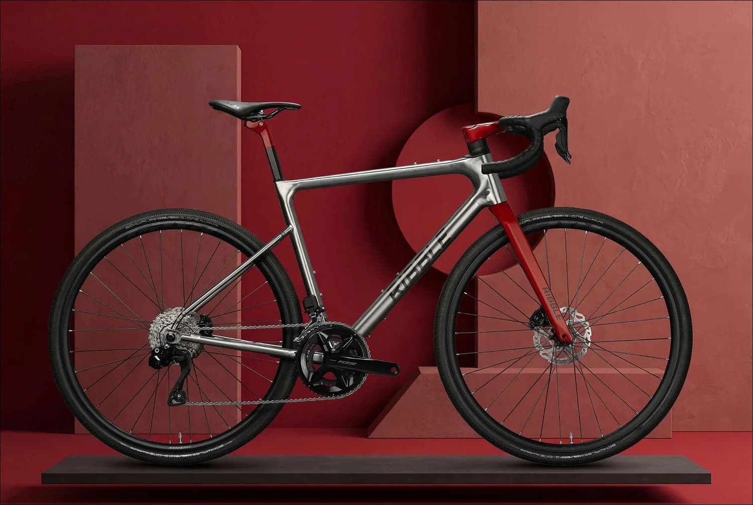 Raw titanium Ribble bike with red CustomColour fork and seatpost on a crimson set