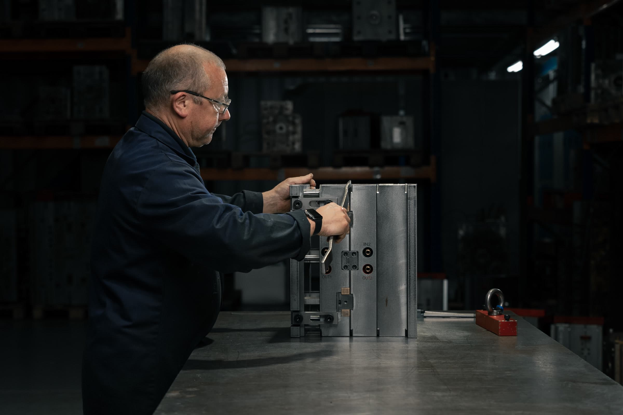AC Plastics technician working on a mould tool in the company workshop