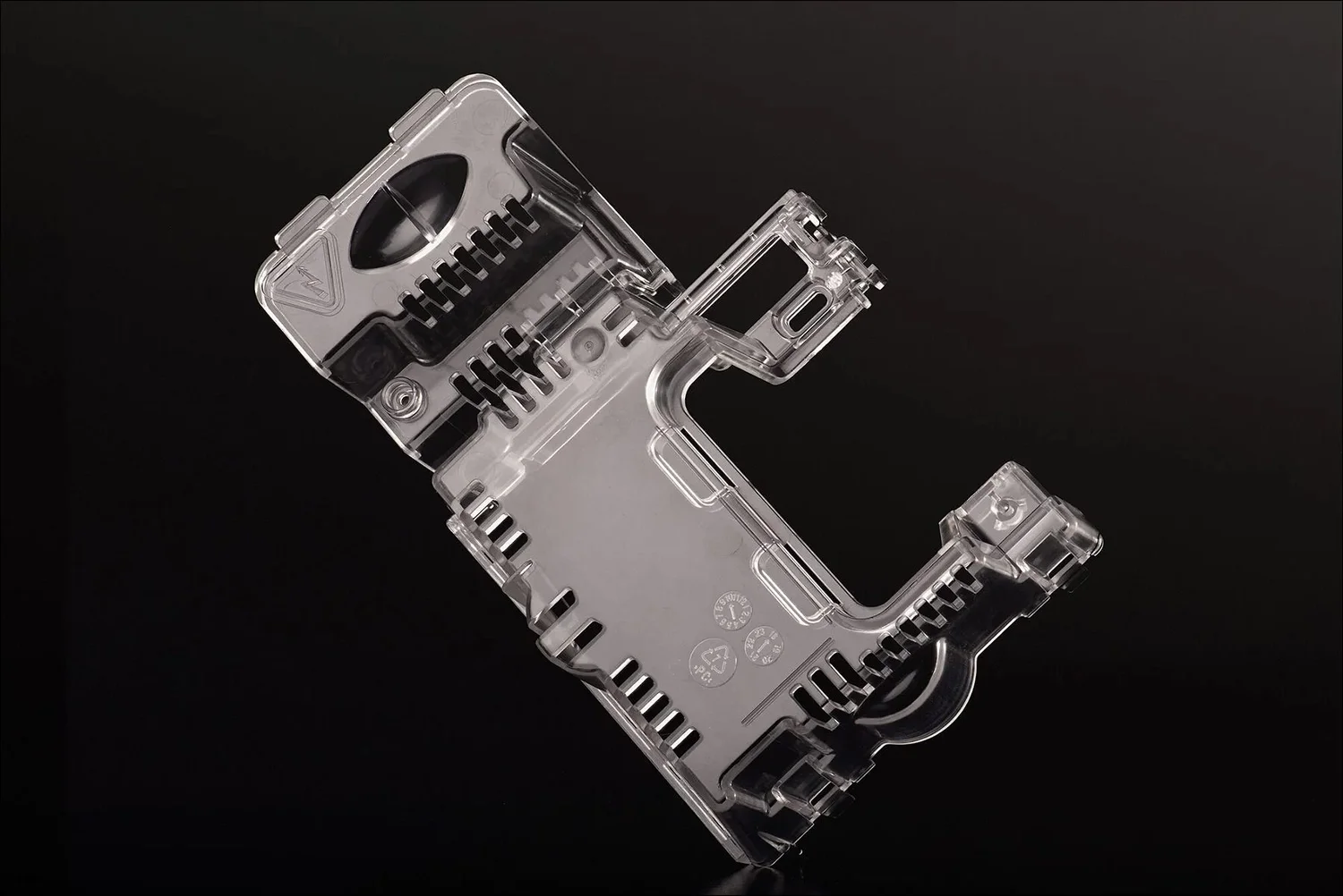 Clear polycarbonate molded part slots symbols