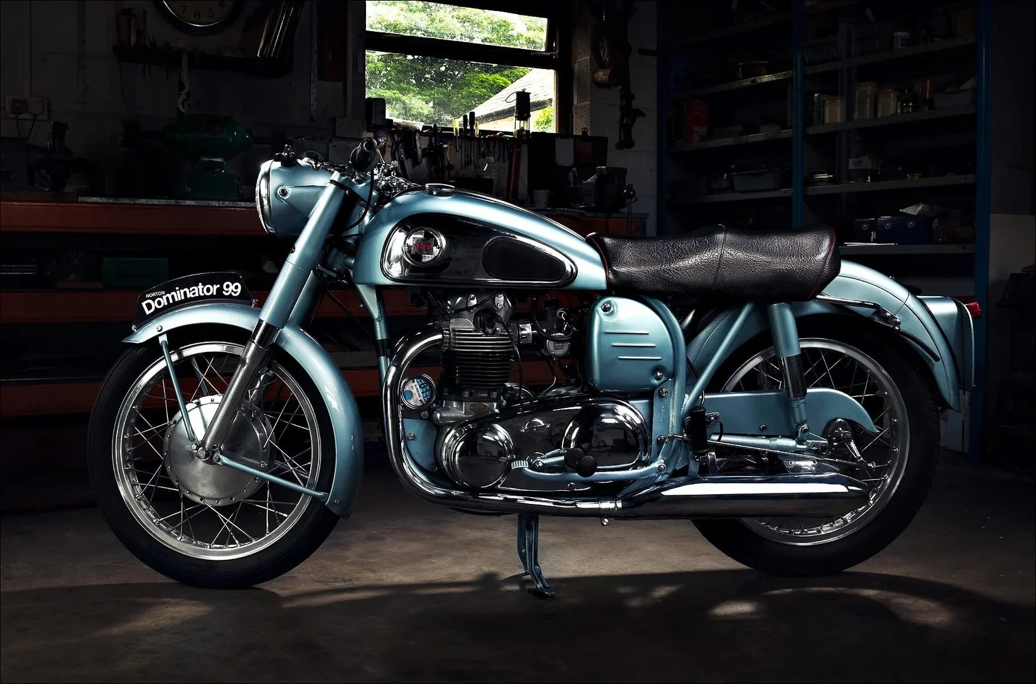 Light blue metallic classic norton dominator motorcycle