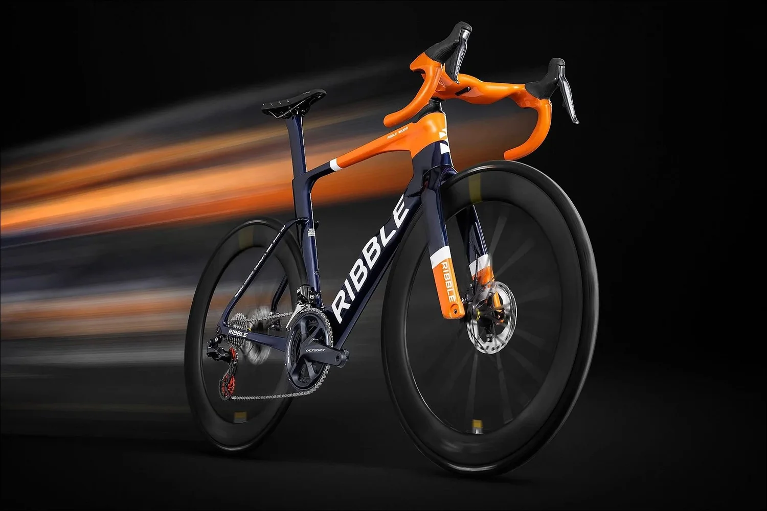 Dynamic speed-blur studio shot of a Ribble road bike