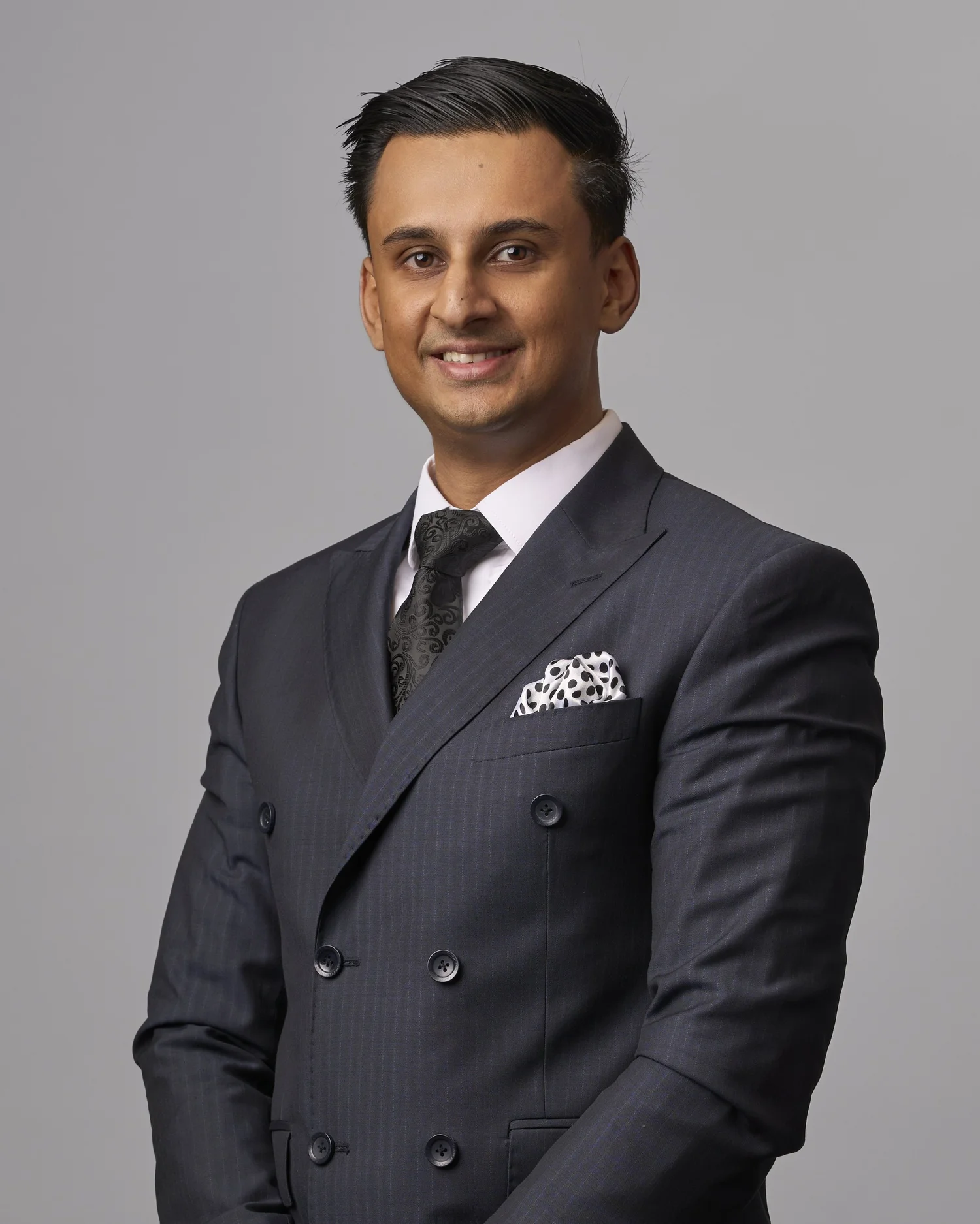 Corporate headshot of Sheroze Nadeem