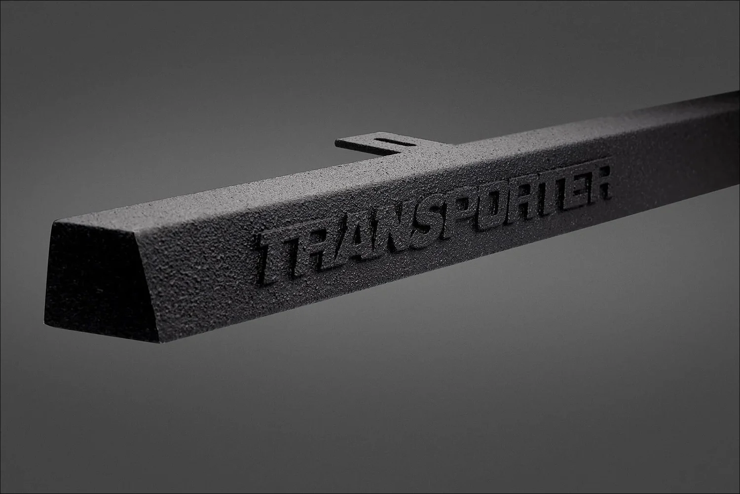 Black textured metal finish product detail photography