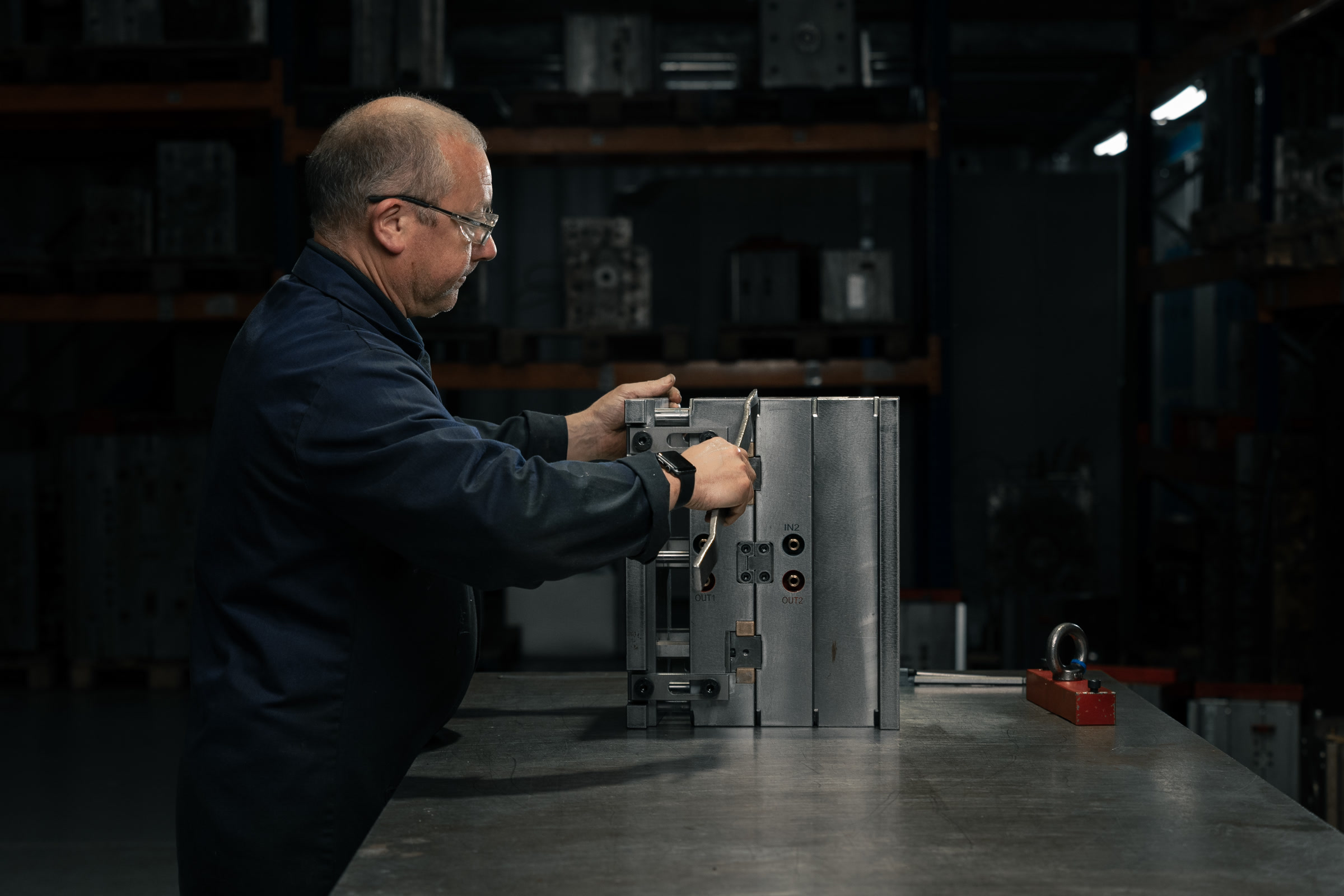 AC Plastics technician working on a mould tool in the company workshop
