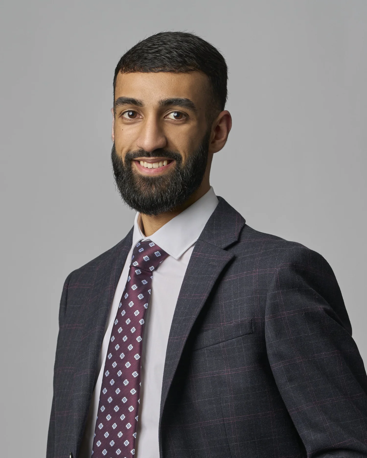 Corporate headshot of Atif Hussain