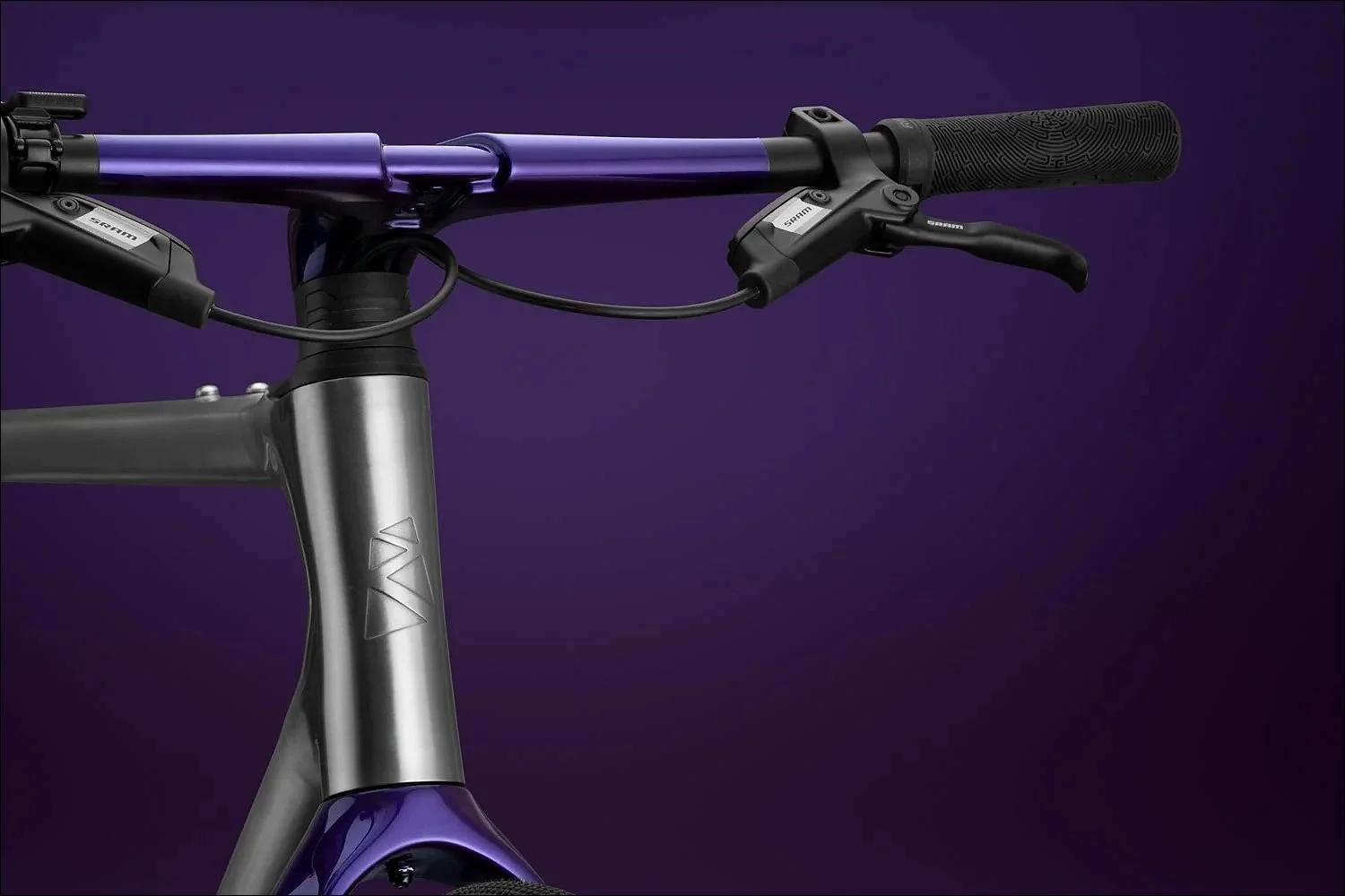 Purple sram cockpit on titanium head tube ribble